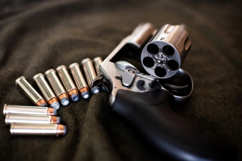two-handguns-silver-357-magnum-revolver | 357 pistol