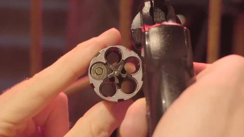 male-hand-reload-revolver-magnum-gun | eaa windicator 357