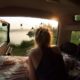 woman-camping-camper-car-drinking-morning | Car Camping Hacks: Different Ways To Sleep In Your Vehicle | Featured