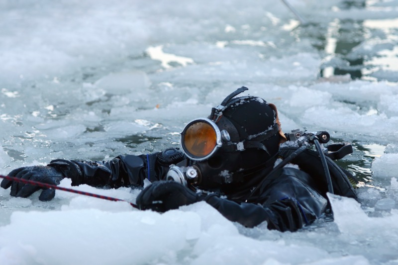 Diver Rising on Surface Between Ice | Ice Diving