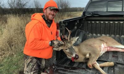 happy-hunter-whitetail-buck-harvested-wisconsin | Where To Shoot A Deer? 9 Ethical Kill Placements You Need To Know | Featured