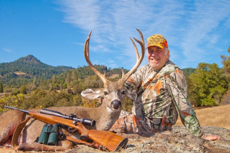 successful-hunter-his-game-blacktailed-buck | hunting deer