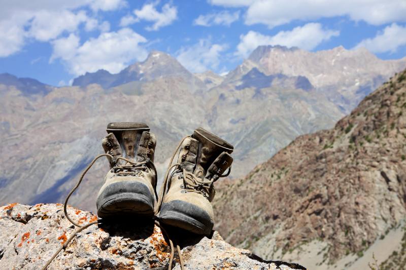 Climbing boots on the rock in the mountains-hiking shoes-ss