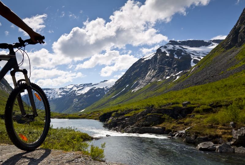 Mountain bike rider view on Norway landscape-hybrid bike-ss