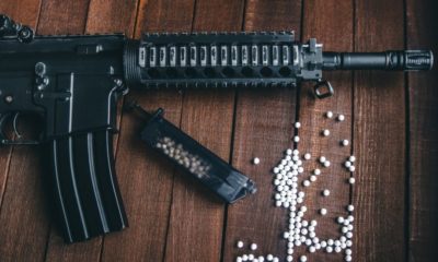 airsoft-loader-on-table-rifle-white | op Factors to Consider When Purchasing Airsoft Guns | Featured