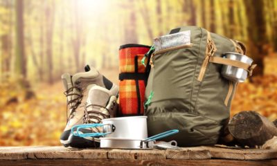 desk top of shoes backpack and plate-Day Hiking Gear-SS-Featured | hiking gear