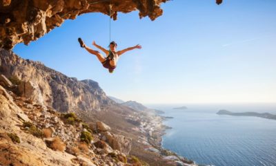 female-rock-climber-falling-cliff-while | Conquering Fear Of Falling When Climbing | The Outside Podcast | Featured