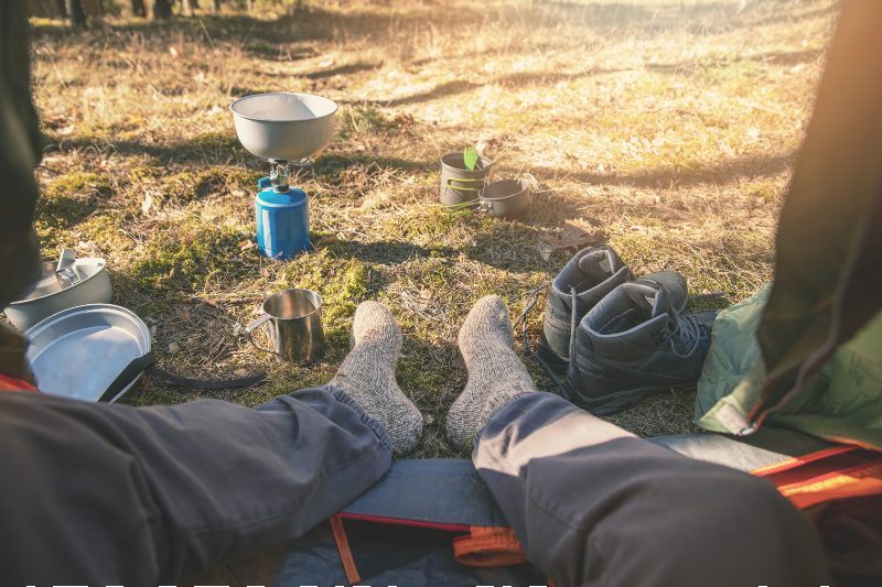 hiker feet with wool socks out of the tent-Day Hiking Gear-SS