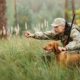 hunter-rifle-dog-forest Hunting In Pennsylvania | Featured