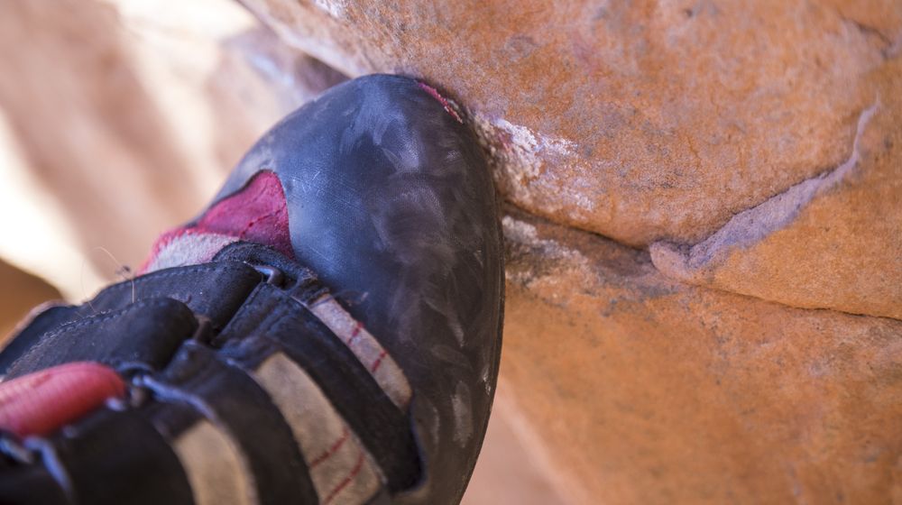 rock-climbing-toe-on-crack | Crack Climbing With Pete Whittaker | Enormocast Podcast | Featured